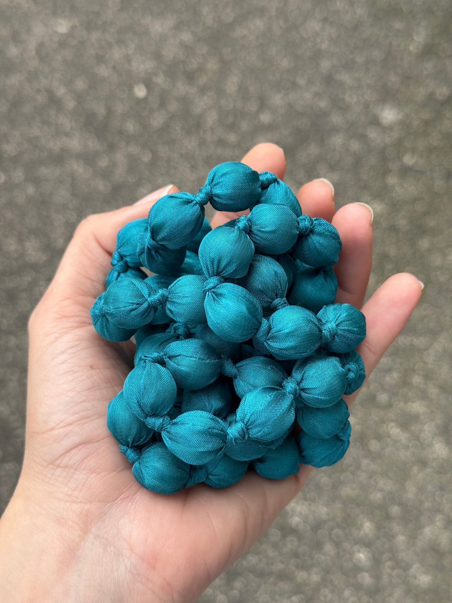 COLLANA PALLINE TESSUTO