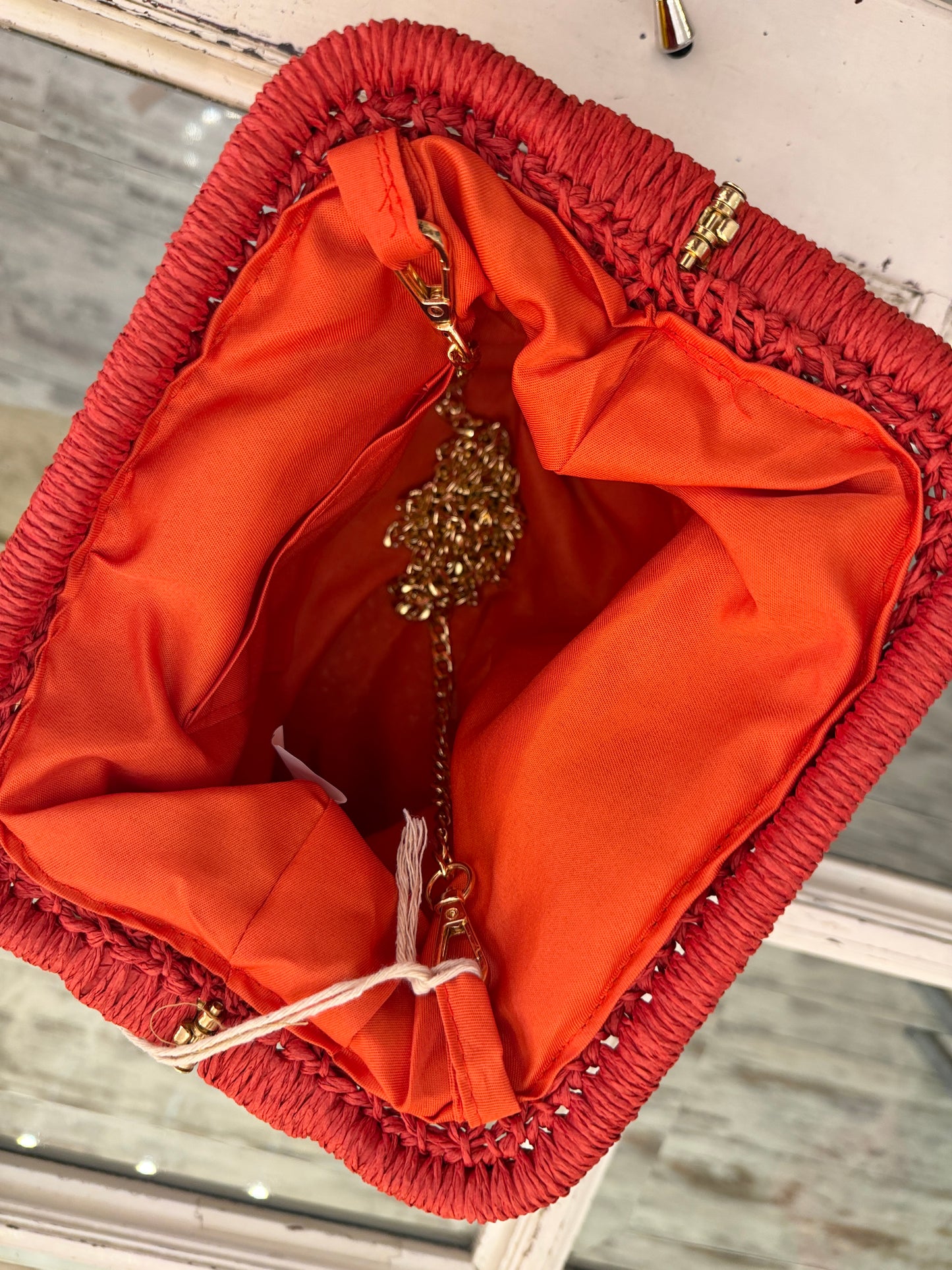CLUTCH PETALI ROSSO RAFIA