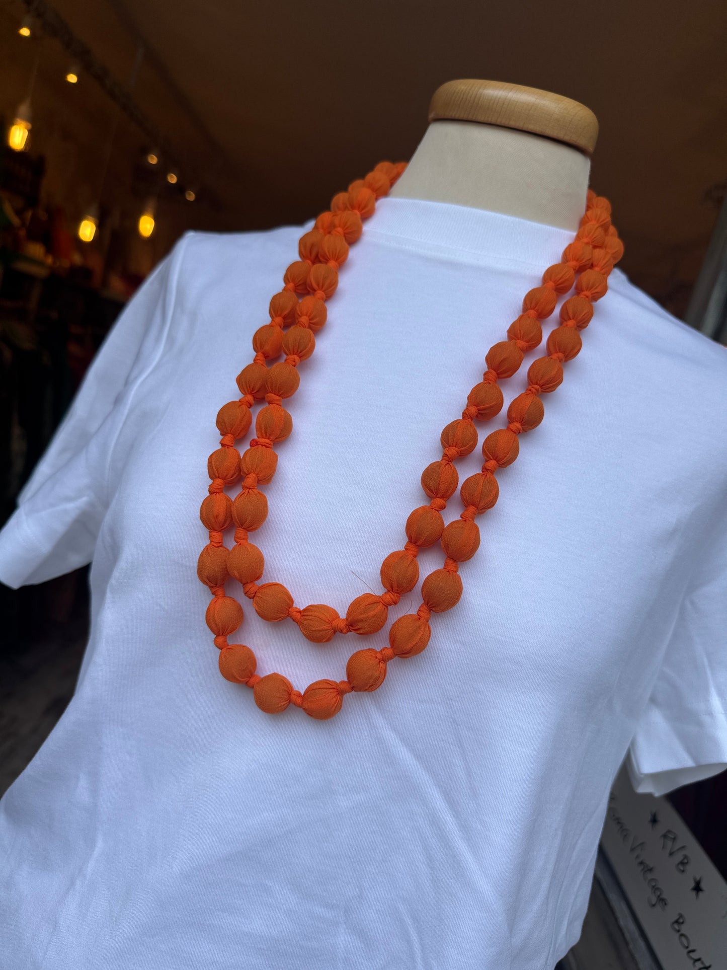 COLLANA PALLINE TESSUTO