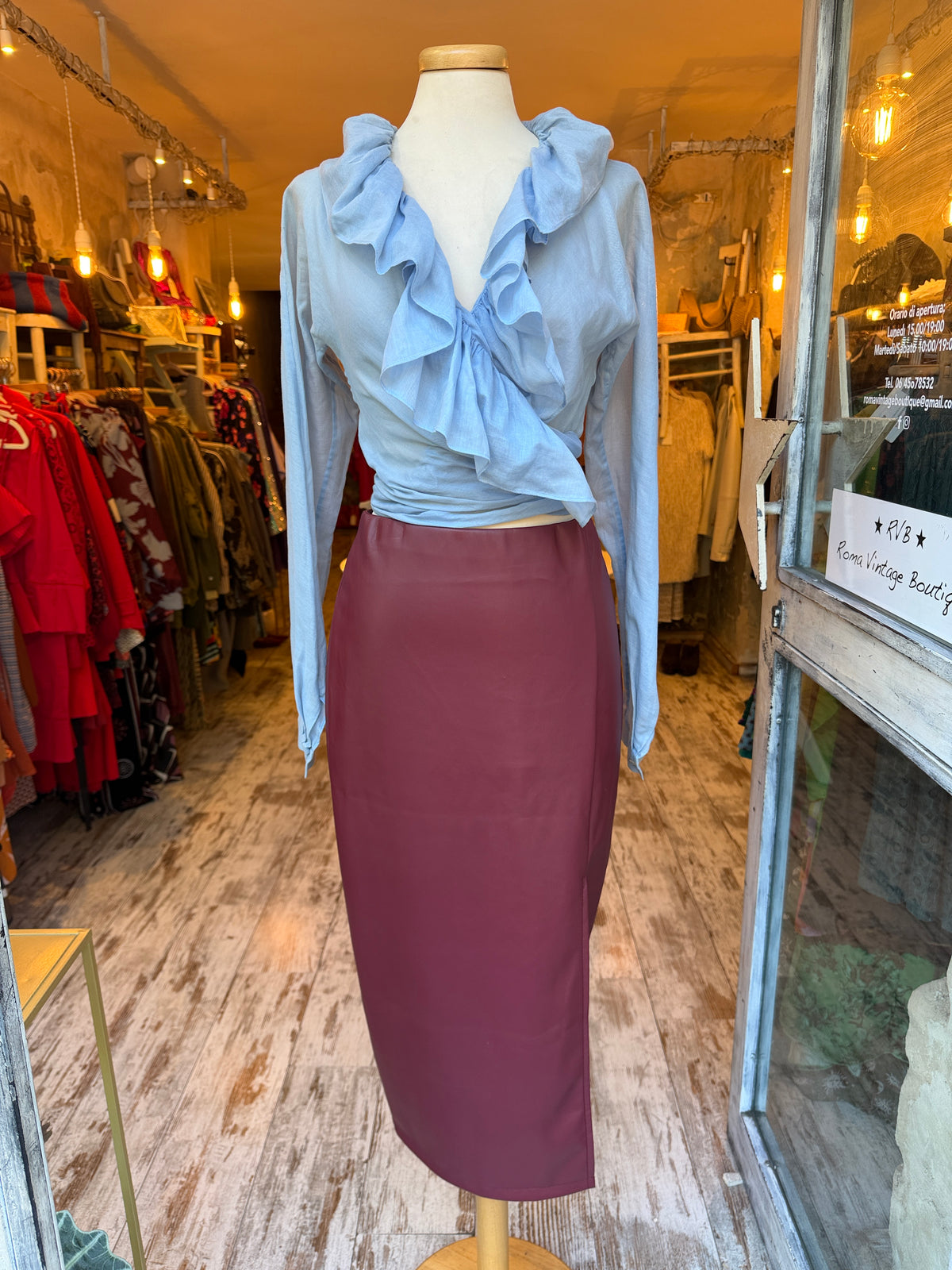 BLUSA SALVATORE FERRAGAMO A PORTAFOGLIO CELESTE ROUCHES