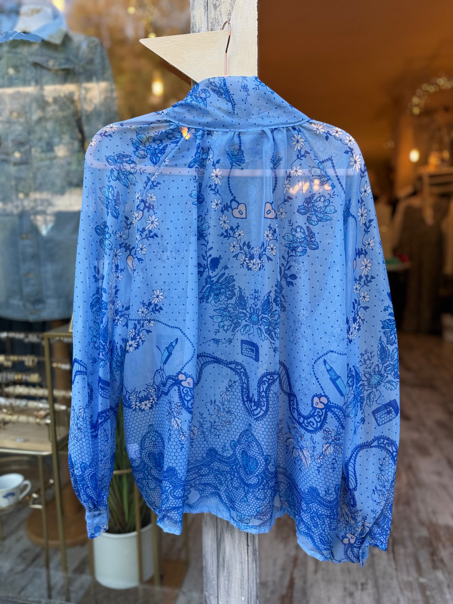 BLUSA CELESTE FANTASIA AZZURRA CON FIOCCO