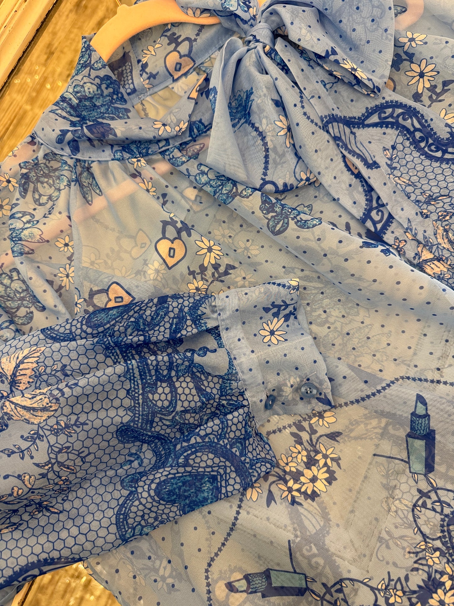 BLUSA CELESTE FANTASIA AZZURRA CON FIOCCO
