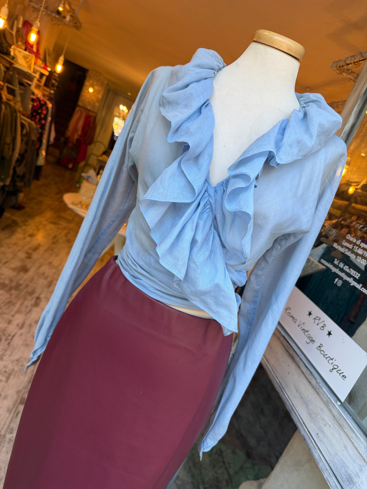 BLUSA SALVATORE FERRAGAMO A PORTAFOGLIO CELESTE ROUCHES