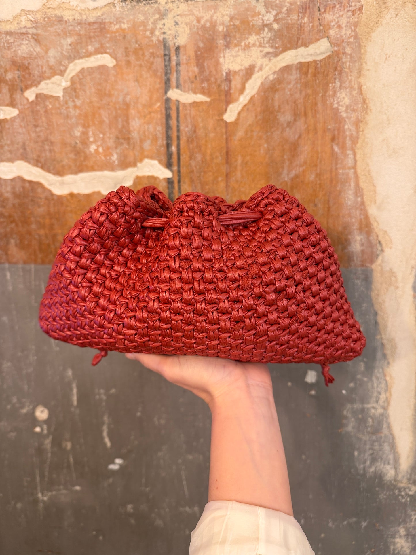 CLUTCH GRANDE INTRECCIATA ROSSO CON TRACOLLA
